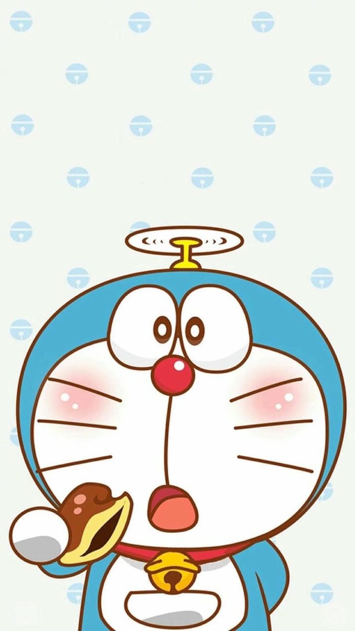 Hình chibi Doraemon ăn bánh rán cute