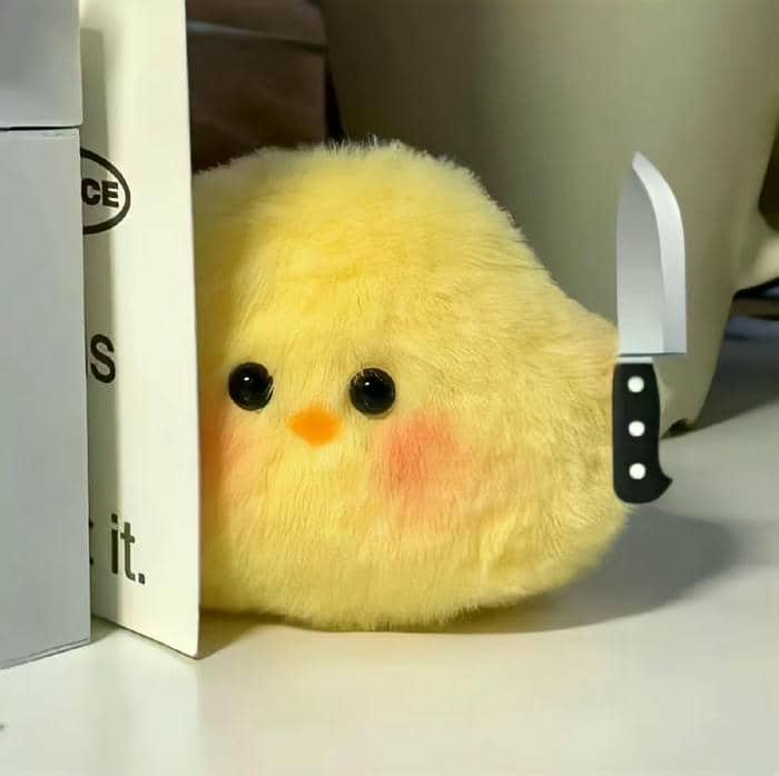 Meme con vịt cầm dao